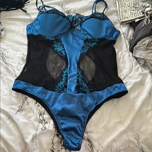 Elegant Blue and Black Lace Chemise with Alluring Cut-Outs